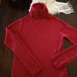 Rust turtleneck cable knit sweater